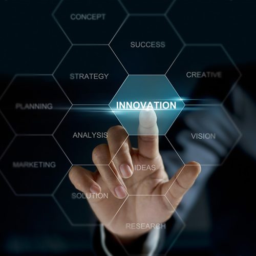 Businesswoman hand touch word innovation on screen, business concept